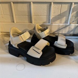 Chunky Black Sole Sandals with Cream Straps